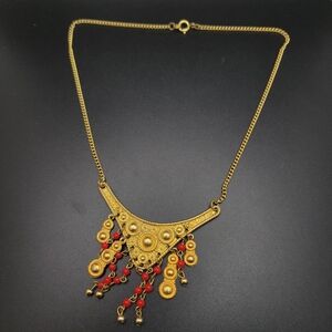 Gold-Tone Statement Necklace with Red Bead Accents